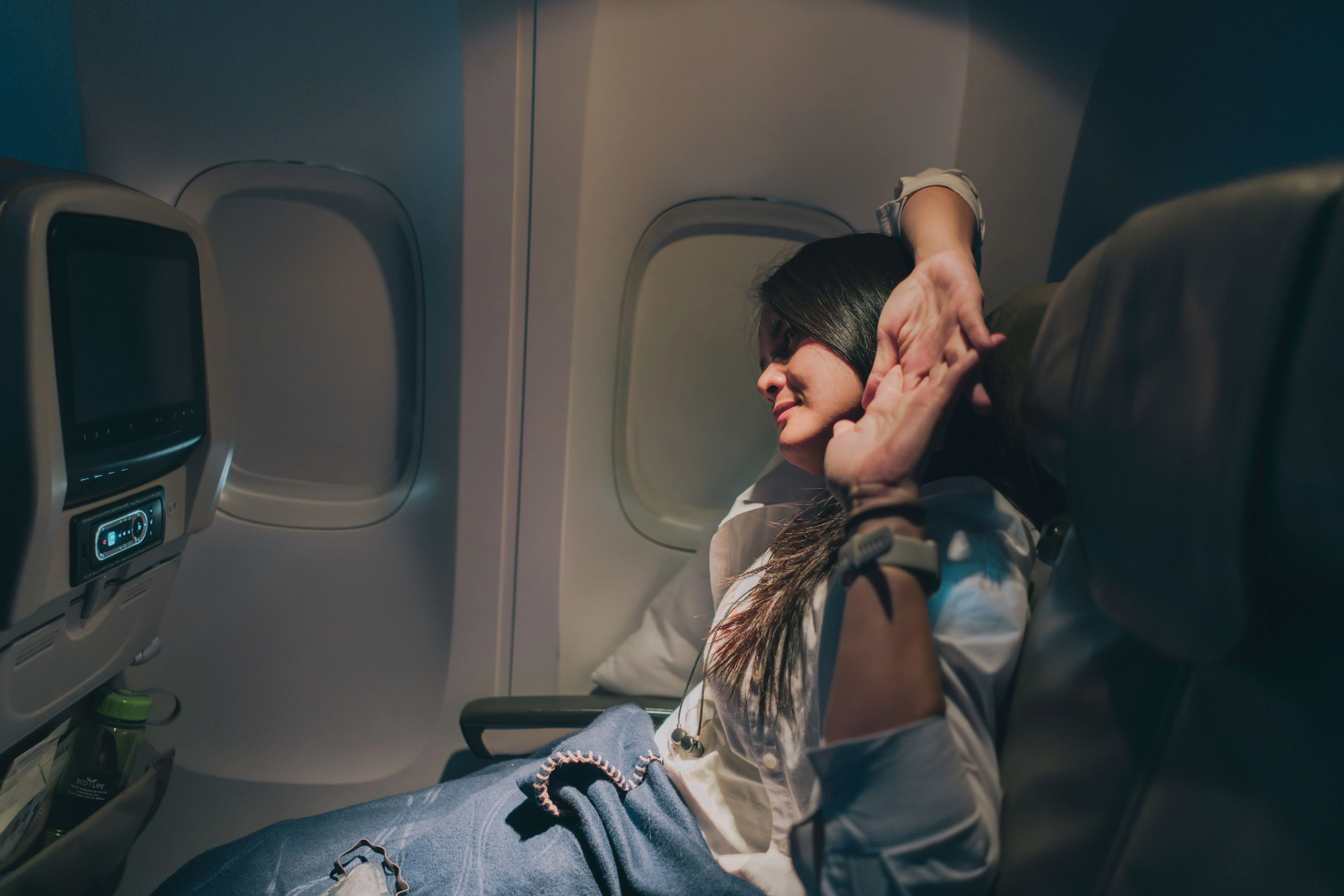 Pilates experts recommend simple in-seat movements to combat stiffness during long-haul flights